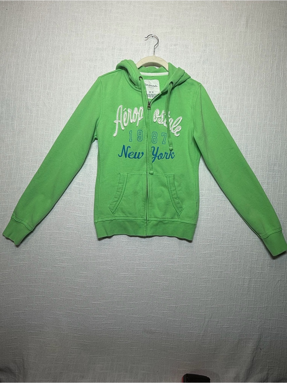 Aeropostale Woman’sGreen Zip-Up Hoodie - New York Graphic size Medium
